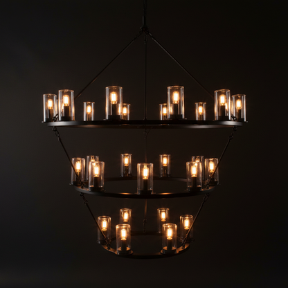 Three-Tiered Ring Chandelier – All tiers lit with warm 2700K candle glow on dark charcoal background