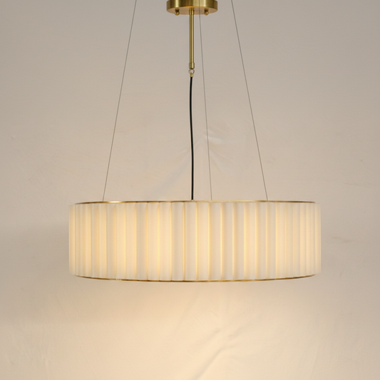 Aura Fluted Drum Pendant Light | Ribbed Glass & Solid H65 Brass – warm white background studio shot