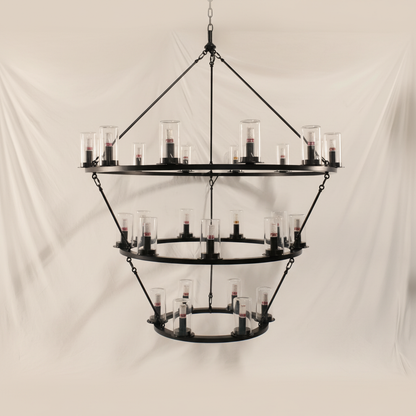 Three-Tiered Circular Ring Chandelier | Matte Black Iron & Cylindrical Glass – warm white background studio shot