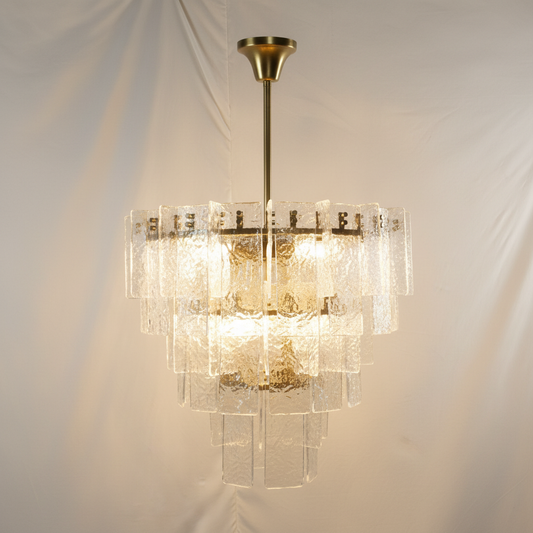 Glacier Cascade Tiered Chandelier | Hand-Cast Ice Glass & Solid H65 Brass – warm white background studio shot