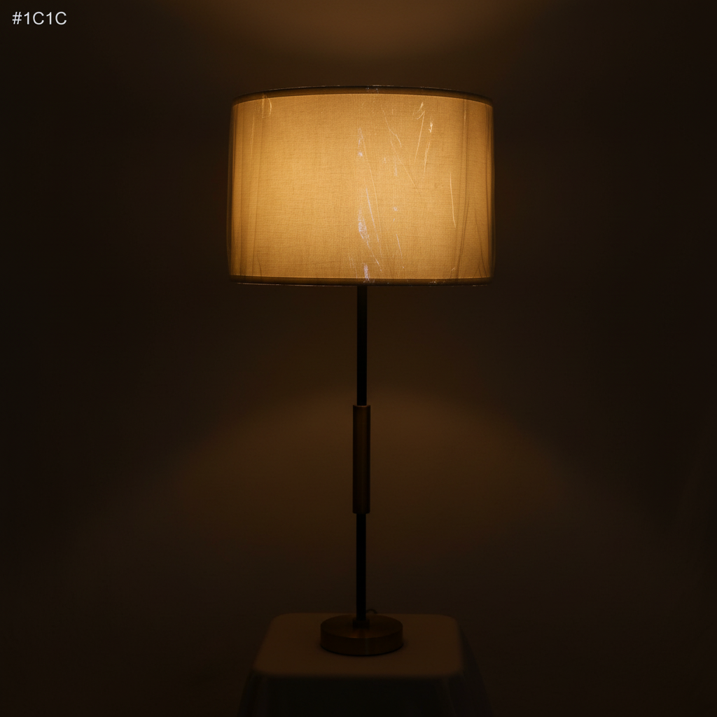 Linear Muse Table Lamp – Warm 2700K glow on dark charcoal background, brass and matte black contrast